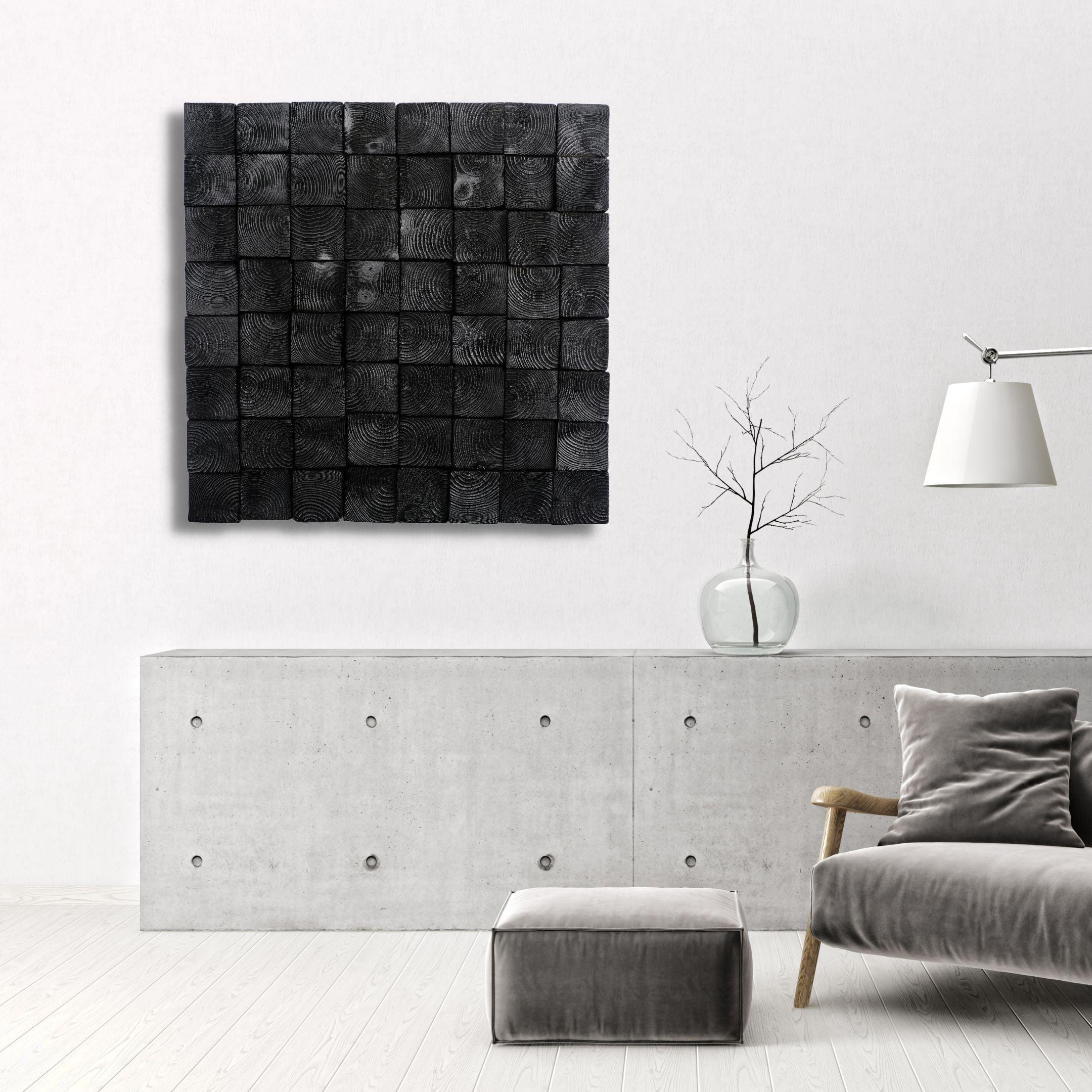 Smoked black wood wall sculpture by Artdesigna, modern abstract wall art piece with textured wooden surface for contemporary decor.