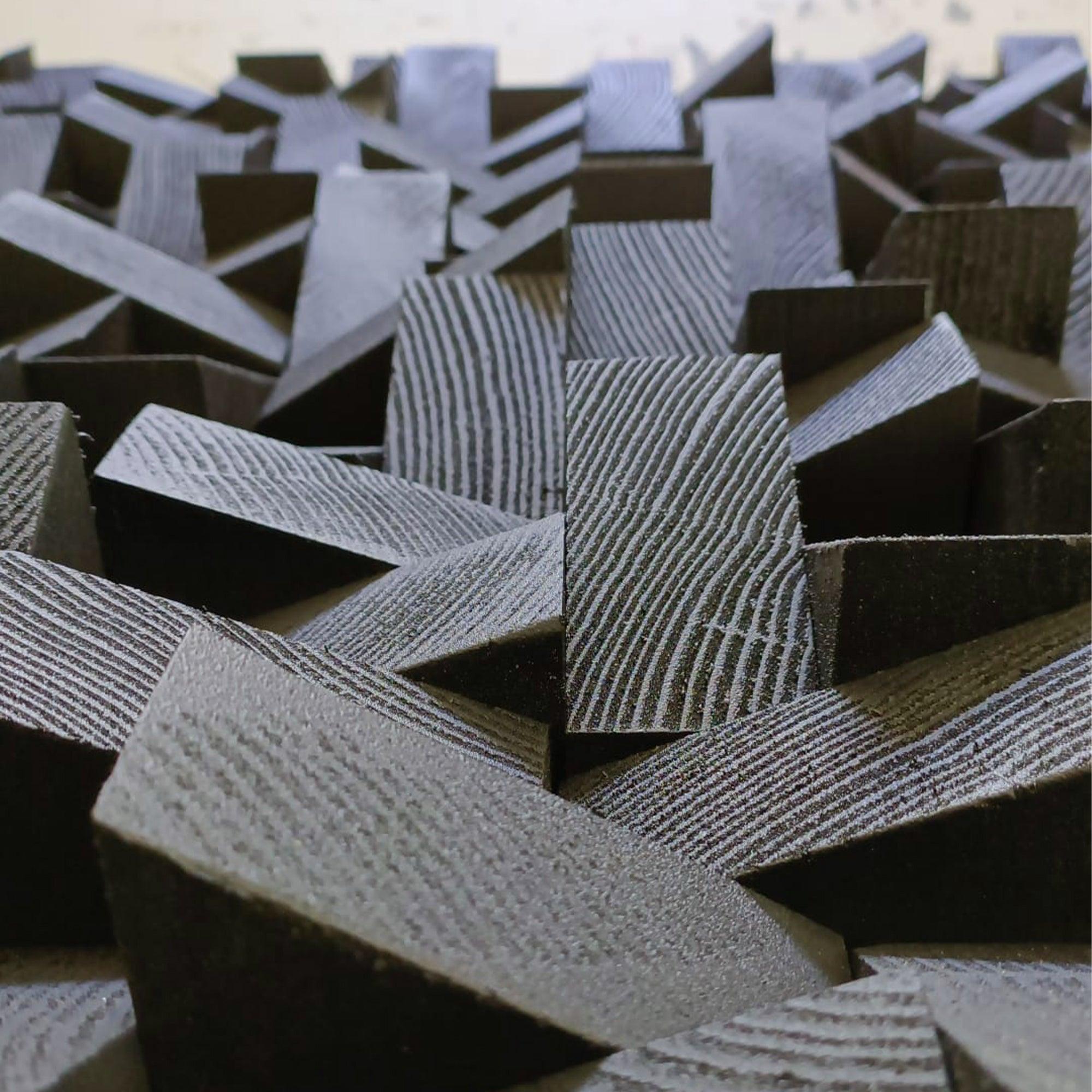 Black Diamond Wall Sculpture by Artdesigna, a modern black wooden wall art piece with geometric diamond shapes for stylish interior decor.